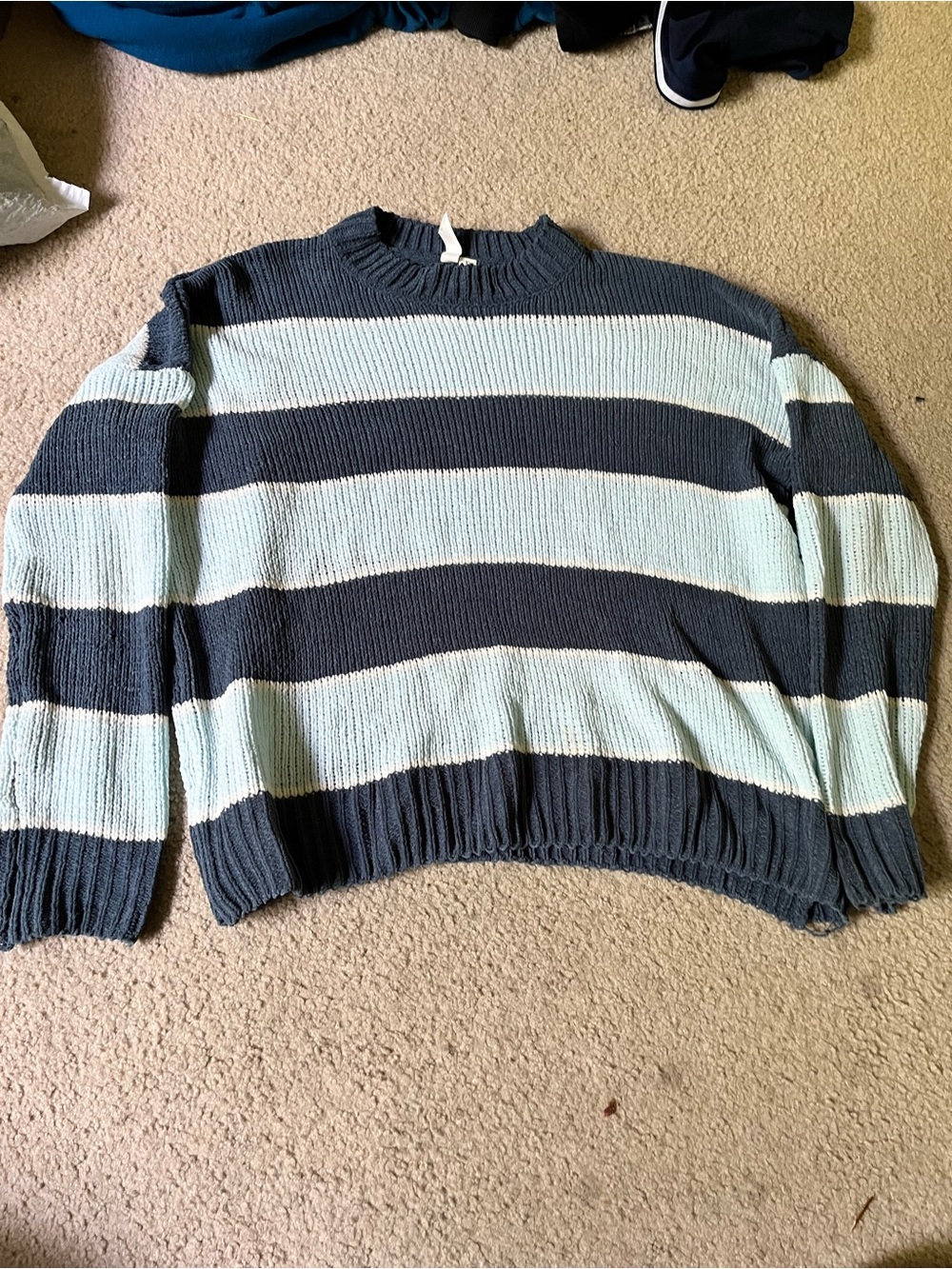 Others Follow women’s blue striped oversized knit sweater